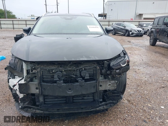 2024 Mazda CX-30 S Select Sport with VIN 3MVDMBBM3RM700797, listed as a IAAI auction lot 42686898 with 23,170 mi miles and . Bid and sale history available at DreamBid. Image 12.