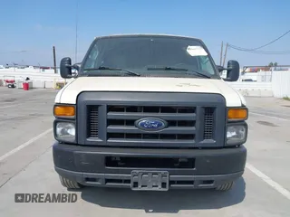 2014 Ford Econoline Cargo Commercial with VIN 1FTNE1EW4EDA90117, listed as a IAAI auction lot 42063775 with 276,021 mi miles and . Bid and sale history available at DreamBid. Image 12.