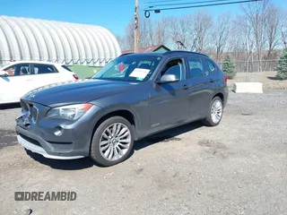 2015 BMW X1 xDrive28i with VIN WBAVL1C59FVY25442, listed as a IAAI auction lot 41854794 with 98,432 mi miles. Bid and sale history available at carsss.com. Image 17.