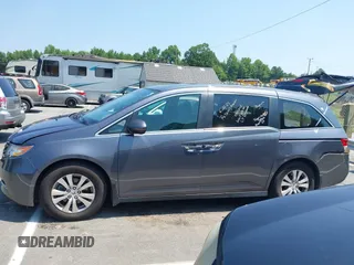 2014 Honda Odyssey EX-L with VIN 5FNRL5H63EB073585, listed as a IAAI auction lot 42673004 with 119,971 mi miles and . Bid and sale history available at DreamBid. Image 14.