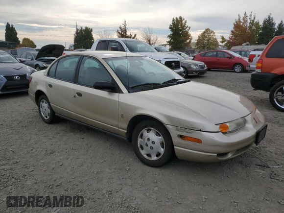 2001 Saturn SL z VIN 1G8ZH52831Z348124, wystawiony jako Copart lot #76058854 z przebiegiem 191 465 mil mil oraz Szkoda całkowita • Salvage title. Historia ofert i sprzedaży dostępna na DreamBid. Obrazek 4.