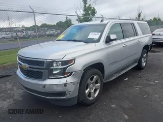 2015 Chevrolet Suburban LT z VIN 1GNSCJKC2FR144528, wystawiony jako IAAI lot #42320028 z przebiegiem 226 076 mil mil oraz . Historia ofert i sprzedaży dostępna na DreamBid. Obrazek 17.