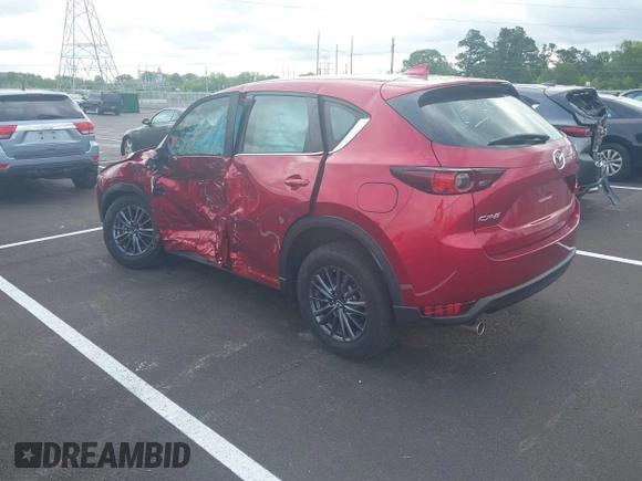 2019 Mazda CX-5 Sport with VIN JM3KFABM5K0627087, listed as a IAAI auction lot 42163866 with 38,050 mi miles and . Bid and sale history available at DreamBid. Image 3.