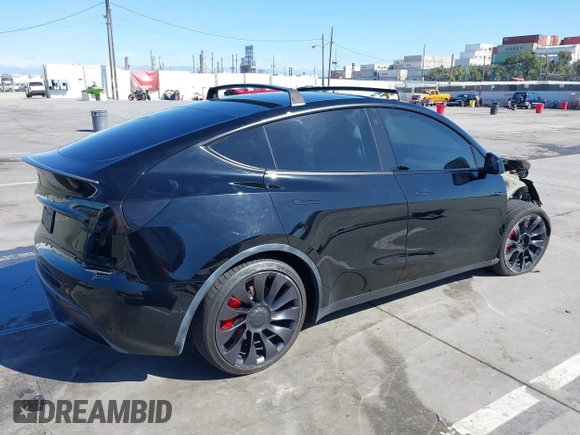2021 Tesla Model Y Performance with VIN 5YJYGDEF9MF251738, listed as a IAAI auction lot 41708950 with 61,248 mi miles and . Bid and sale history available at DreamBid. Image 4.