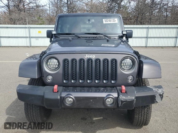 2018 Jeep Wrangler Unlimited Sahara with VIN 1C4BJWEG7JL856331, listed as a Copart auction lot 50246135 with 101,014 mi miles and Salvage title. Bid and sale history available at DreamBid. Image 5.