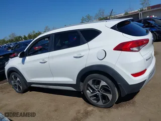 2017 Hyundai Tucson Value with VIN KM8J33A27HU438902, listed as a IAAI auction lot 41835502 with 84,885 mi miles. Bid and sale history available at carsss.com. Image 14.