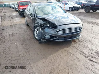 2018 Ford Fusion SE z VIN 3FA6P0HD7JR259606, wystawiony jako IAAI lot #41649797 z przebiegiem 94 094 mil mil oraz . Historia ofert i sprzedaży dostępna na DreamBid. Obrazek 6.