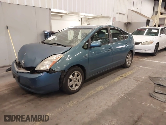 2006 Toyota Prius with VIN JTDKB20U463129691, listed as a IAAI auction lot 40922316 with 301,945 mi miles. Bid and sale history available at carsss.com. Image 2.