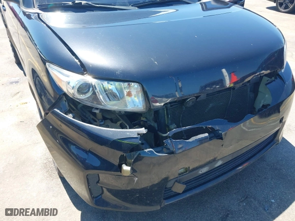 2012 Scion xB with VIN JTLZE4FE0CJ008816, listed as a IAAI auction lot 42022348 with 179,463 mi miles. Bid and sale history available at carsss.com. Image 6.