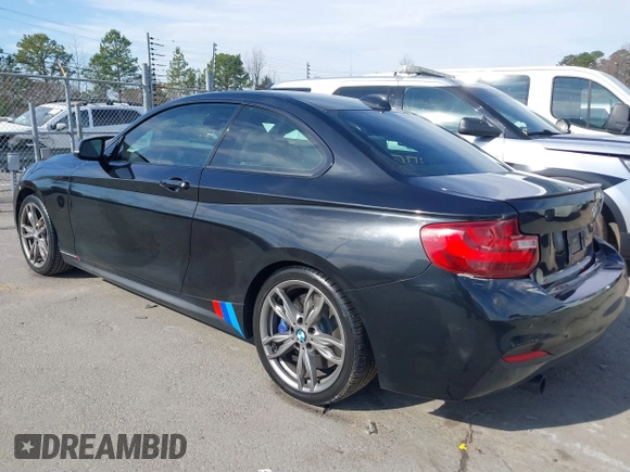 2015 BMW 2 Series M235i with VIN WBA1J7C55FV358964, listed as a IAAI auction lot 41674800 with 63,504 mi miles and . Bid and sale history available at carsss.com. Image 3.