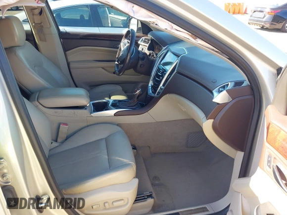 2013 Cadillac SRX Performance Collection with VIN 3GYFNDE39DS654591, listed as a IAAI auction lot 41855098 with 114,965 mi miles. Bid and sale history available at carsss.com. Image 5.