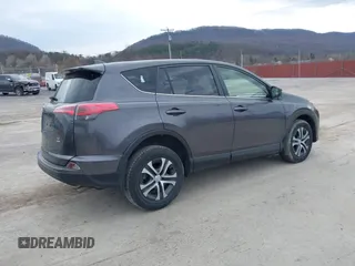 2018 Toyota RAV4 LE with VIN JTMBFREV4JJ742428, listed as a IAAI auction lot 41912813 with 114,159 mi miles. Bid and sale history available at carsss.com. Image 4.