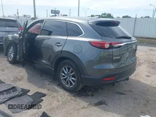 2019 Mazda CX-9 Sport with VIN JM3TCABY0K0327361, listed as a IAAI auction lot 42362232 with 264,699 mi miles and . Bid and sale history available at DreamBid. Image 3.