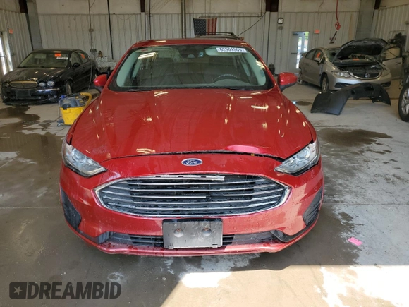 2020 Ford Fusion SE z VIN 3FA6P0LU3LR144513, wystawiony jako Copart lot #62904305 z przebiegiem 160 372 mil mil oraz Szkoda całkowita • Salvage title. Historia ofert i sprzedaży dostępna na DreamBid. Obrazek 5.