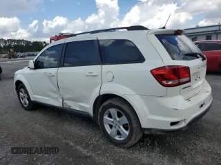 2012 Dodge Journey SXT with VIN 3C4PDCBG5CT135724, listed as a Copart auction lot 56938415 with 180,548 mi miles and Salvage title. Bid and sale history available at DreamBid. Image 2.