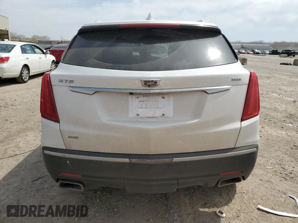 2017 Cadillac XT5 Premium Luxury AWD z VIN 1GYKNERS5HZ319259, wystawiony jako Copart lot #52554725 z przebiegiem Nie podano mil oraz Szkody całkowita. Historia ofert i sprzedaży dostępna na DreamBid. Obrazek 6.