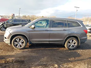2016 Honda Pilot EX-L with VIN 5FNYF6H75GB053780, listed as a IAAI auction lot 41340590 with 203,190 mi miles. Bid and sale history available at carsss.com. Image 14.