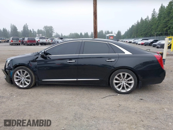 2016 Cadillac XTS Luxury Collection z VIN 2G61N5S38G9141105, wystawiony jako IAAI lot #42430714 z przebiegiem 105 122 mil mil oraz . Historia ofert i sprzedaży dostępna na DreamBid. Obrazek 14.