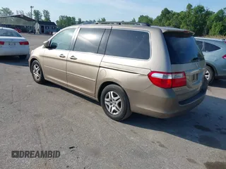 2006 Honda Odyssey EX-L with VIN 5FNRL38656B414992, listed as a IAAI auction lot 42179924 with 298,440 mi miles. Bid and sale history available at carsss.com. Image 3.