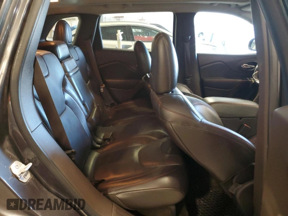 2015 Jeep Cherokee Trailhawk with VIN 1C4PJMBS5FW615845, listed as a Copart auction lot 52824635 with 134,873 mi miles and Salvage Title. Bid and sale history available at carsss.com. Image 11.