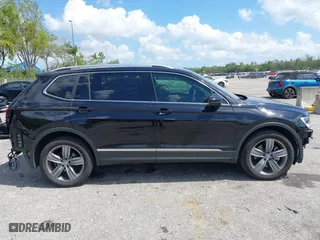 2021 Volkswagen Tiguan SE with VIN 3VV2B7AX1MM150534, listed as a IAAI auction lot 41814162 with 49,079 mi miles. Bid and sale history available at carsss.com. Image 13.