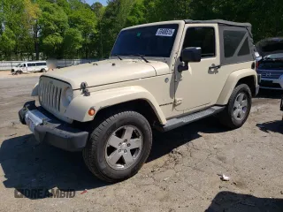 2011 Jeep Wrangler Sahara z VIN 1J4AA5D10BL528862, wystawiony jako Copart lot #53488515 z przebiegiem 198 865 mil mil oraz Szkoda całkowita • Salvage title. Historia ofert i sprzedaży dostępna na DreamBid. Obrazek 1.