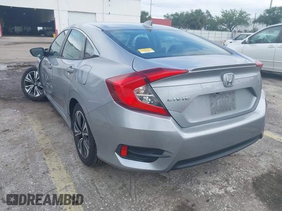 2017 Honda Civic Sedan EX-L with VIN 2HGFC1F73HH654625, listed as a IAAI auction lot 41962609 with 77,991 mi miles. Bid and sale history available at carsss.com. Image 3.