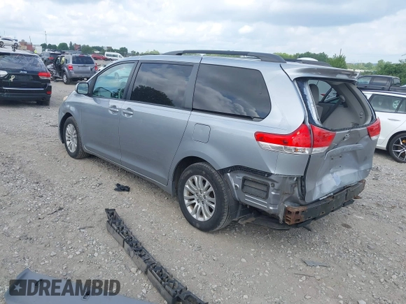 2011 Toyota Sienna XLE AAS with VIN 5TDYK3DCXBS133044, listed as a IAAI auction lot 42722691 with 179,497 mi miles and . Bid and sale history available at DreamBid. Image 3.