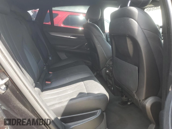 2015 BMW X6 xDrive35i z VIN 5UXKU2C58F0N77513, wystawiony jako Copart lot #55859345 z przebiegiem 82 560 mil mil oraz Szkoda całkowita • Salvage title. Historia ofert i sprzedaży dostępna na DreamBid. Obrazek 11.