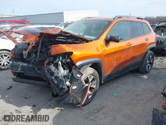 2015 Jeep Cherokee Trailhawk with VIN 1C4PJMBB3FW642266, listed as a IAAI auction lot 41510571 with 72,030 mi miles and . Bid and sale history available at DreamBid. Image 17.