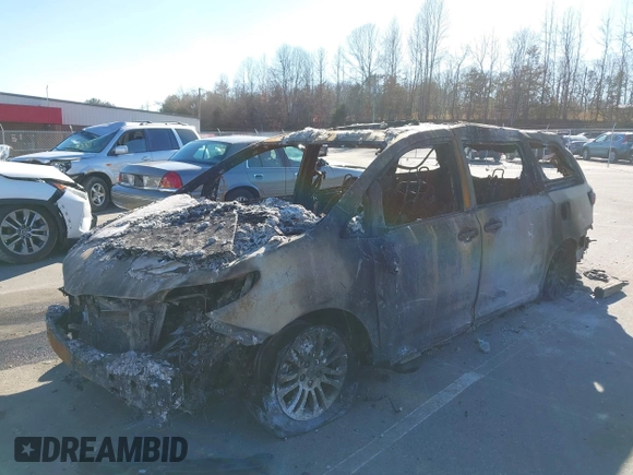 2015 Toyota Sienna XLE with VIN 5TDYK3DC4FS630998, listed as a IAAI auction lot 41672959 with Not provided miles and . Bid and sale history available at DreamBid. Image 2.