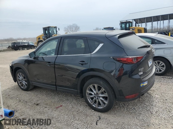 2021 Mazda CX-5 Grand Touring with VIN JM3KFBDM6M0401517, listed as a Copart auction lot 51019645 with 55,906 mi miles and Salvage Title. Bid and sale history available at DreamBid. Image 2.