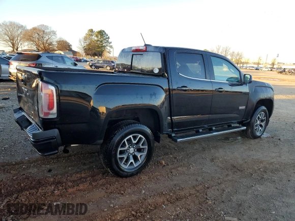 2016 GMC Canyon 2WD SLE with VIN 1GTG5CE33G1386325, listed as a Copart auction lot 86988134 with 91,610 mi miles and Salvage Title. Bid and sale history available at carsss.com. Image 3.