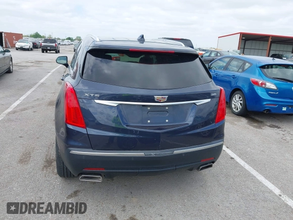 2019 Cadillac XT5 Luxury FWD with VIN 1GYKNCRS7KZ199542, listed as a IAAI auction lot 42032139 with 79,487 mi miles and . Bid and sale history available at DreamBid. Image 16.