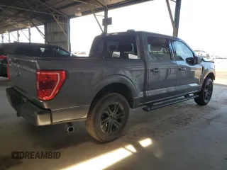 2021 Ford F-150 XL with VIN 1FTEW1C58MFB54623, listed as a Copart auction lot 55072405 with 115,374 mi miles and Salvage title. Bid and sale history available at DreamBid. Image 3.