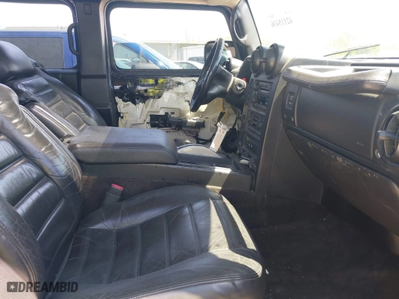 2005 Hummer H2 SUV with VIN 5GRGN23U25H128791, listed as a IAAI auction lot 42115436 with 286,818 mi miles. Bid and sale history available at carsss.com. Image 5.