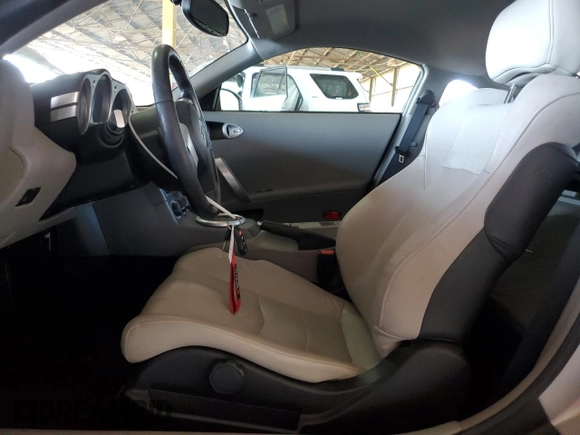 2003 Nissan 350Z Touring with VIN JN1AZ34EX3T018724, listed as a Copart auction lot 67601584 with 24,288 mi miles and Salvage Title. Bid and sale history available at carsss.com. Image 7.