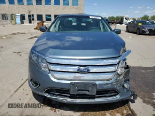 2012 Ford Fusion Hybrid z VIN 3FADP0L3XCR176552, wystawiony jako Copart lot #55787415 z przebiegiem 156 806 mil mil oraz Szkoda całkowita • Salvage title. Historia ofert i sprzedaży dostępna na DreamBid. Obrazek 5.