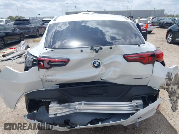 2025 BMW X2 xDrive28i with VIN WBX63GM06S5066386, listed as a IAAI auction lot 41812615 with 1,598 mi miles. Bid and sale history available at carsss.com. Image 6.