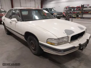 1992 Buick LeSabre Custom with VIN 1G4HP53LXNH549226, listed as a IAAI auction lot 42068161 with 233,126 mi miles. Bid and sale history available at carsss.com. Image 1.