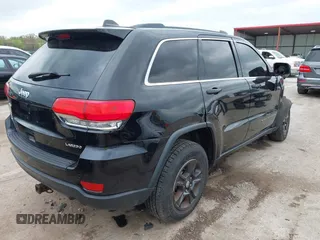 2017 Jeep Grand Cherokee Laredo with VIN 1C4RJFAG2HC649408, listed as a IAAI auction lot 42072440 with 58,818 mi miles and . Bid and sale history available at DreamBid. Image 4.