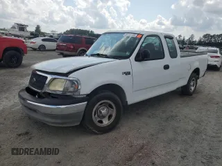 2003 Ford F-150 XL with VIN 1FTRX17213NA24329, listed as a Copart auction lot 60544105 with 152,587 mi miles and Salvage title. Bid and sale history available at DreamBid. Image 1.