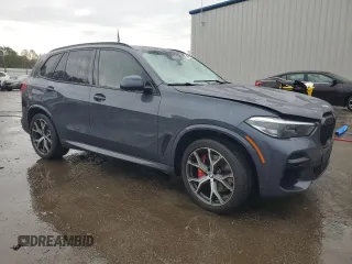 2022 BMW X5 sDrive40i with VIN 5UXCR4C02N9J24164, listed as a Copart auction lot 44761855 with 51,995 mi miles and Salvage Title. Bid and sale history available at carsss.com. Image 4.