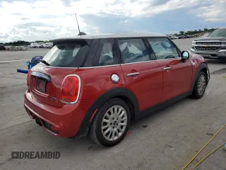 2015 MINI Hardtop 4 Door S z VIN WMWXU3C54F2B57314, wystawiony jako Copart lot #56327705 z przebiegiem 89 986 mil mil oraz Szkody całkowita. Historia ofert i sprzedaży dostępna na DreamBid. Obrazek 3.