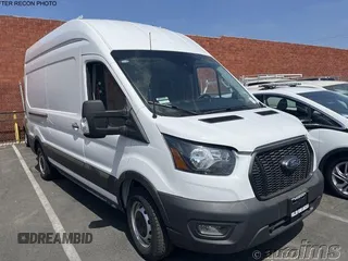 2023 Ford Transit Cargo with VIN 1FTBR1X85PKC01942, listed as a IAAI auction lot 42845488 with 726 mi miles and . Bid and sale history available at DreamBid. Image 1.