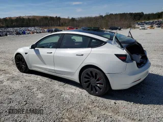 2023 Tesla Model 3 Performance with VIN 5YJ3E1ECXPF551216, listed as a Copart auction lot 49398655 with 34,903 mi miles and Salvage Title. Bid and sale history available at carsss.com. Image 2.