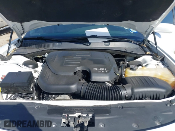 2015 Dodge Charger SXT with VIN 2C3CDXHG8FH725446, listed as a IAAI auction lot 41742400 with 84,579 mi miles and . Bid and sale history available at DreamBid. Image 10.