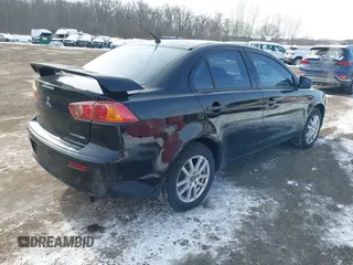 2009 Mitsubishi Lancer DE with VIN JA3AU16U39U000541, listed as a IAAI auction lot 41388897 with 226,951 mi miles. Bid and sale history available at carsss.com. Image 4.