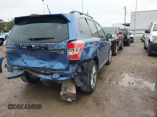 2015 Subaru Forester 2.5i Touring with VIN JF2SJAUC6FH440333, listed as a IAAI auction lot 41414701 with 115,223 mi miles. Bid and sale history available at carsss.com. Image 4.