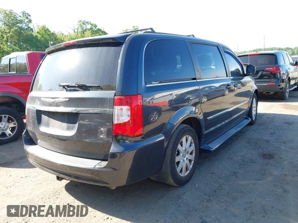 2014 Chrysler Town & Country Touring with VIN 2C4RC1BG2ER124461, listed as a IAAI auction lot 42181413 with 181,360 mi miles and . Bid and sale history available at DreamBid. Image 4.